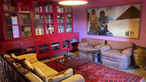 a living room with a couch and a table at Posada de la cruz#3 in Querétaro