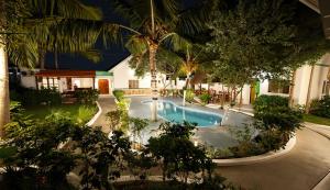 an overhead view of a swimming pool in a resort at Green Oasis in Nungwi