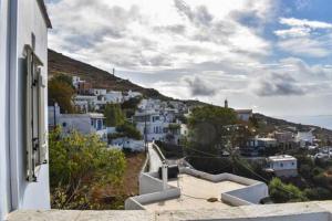 a view of a town with white buildings on a hill at Terpsithea in Triandáros