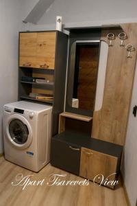 a washer and dryer in a tiny house at Apart Tsarevets View - Free PARKING in Veliko Tŭrnovo