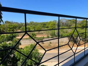a view from a window of a road at Figtree 1bedroom by kiv in Kilifi