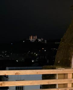 a view of a city at night at Premium Apartment with Dover Castle Views, Central Dover in Dover