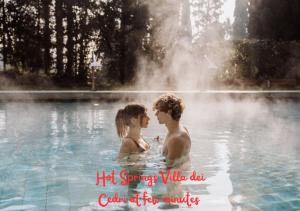 a boy and a girl are in a fountain at Lake-Hot Springs-Gardaland, Private Parking at Dolce Duplex Lazise in Lazise +28 photos