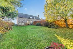 an exterior view of a house with a yard at 2 Bed in Duns oc-c34024 in Duns