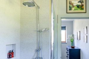 a shower in the corner of a bathroom at 3 Bed in Loddiswell oc-t34185 in Churchstow