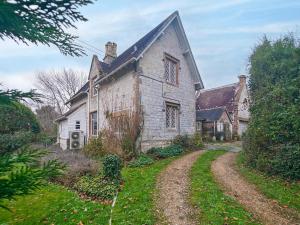 an old house with a dirt road in front of it at 4 Bed in Lower Bockhampton oc-t34129 in West Stafford