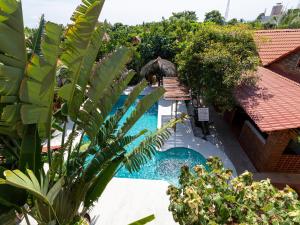 an image of a swimming pool at a resort at Las Barracas de la Barra in Malucano +11 photos