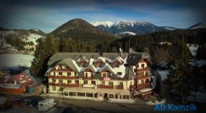 an aerial view of a large house in the mountains at Donovaly Kamzík in Donovaly