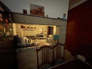 a kitchen with a counter and a stove top oven at Cozy Private Room with Jacuzzi Maadi in Cairo