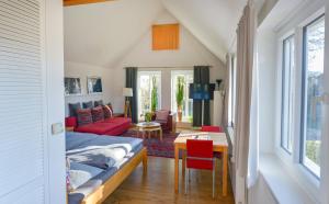 a living room with a couch and a table at Apartment Haak in Halle Westfalen
