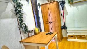 a dressing room with a table and a mirror at STUGA bei GRETA in Marl +5 photos