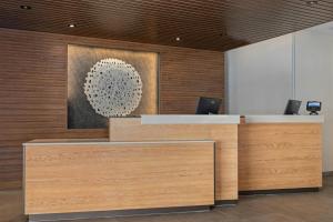 an office with a reception desk with a painting at Fairfield Inn & Suites Dixon in Dixon +13 photos