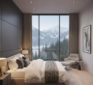 a bedroom with a bed and a large window with mountains at GLD Home in Sapanca