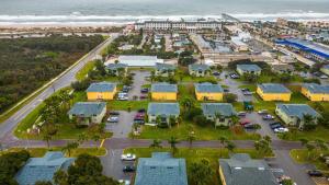 an aerial view of a town with houses and the ocean at Fair Seas Clipper Condo for 6 in Saint Augustine Beach