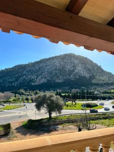 a view of a mountain from a balcony at Pollensa apartament in Pollença +6 photos