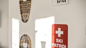 a exit sign and a cross sign on a wall at Mountain View Villa in Red Lodge