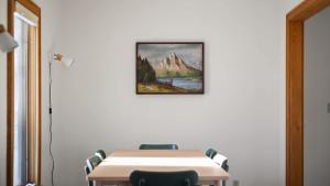a conference room with a table and chairs at Grizzly Grotto in Red Lodge