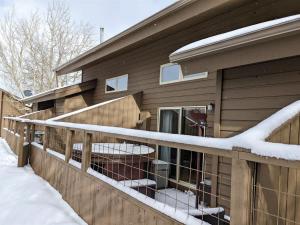 a house with snow on the balcony at Putter`s Inn in Red Lodge