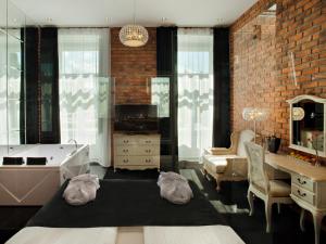 Posteľ alebo postele v izbe v ubytovaní Hotel Betmanowska Main Square Residence Adults Only