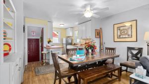 a kitchen and dining room with a table and chairs at Alpine Adventure in Red Lodge