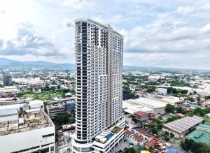 an overhead view of a tall building in a city at Jtower Residences Rad Staycation in SM Jmall in Mandaue City