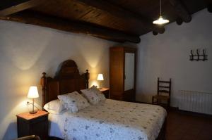 Postel nebo postele na pokoji v ubytování Casa Parramon