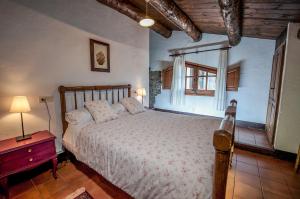 Postel nebo postele na pokoji v ubytování Casa Parramon