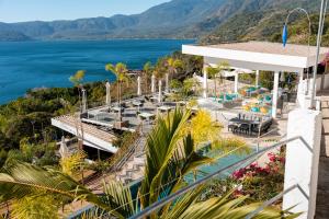 an aerial view of a resort with the ocean at Hotel y Restaurante Buganvilias in Las Aradas