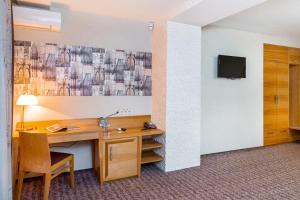 TV a/nebo společenská místnost v ubytování Zagrava Hotel