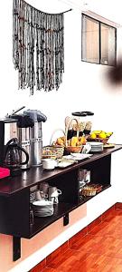 a kitchen with a counter with food on it at AMARU Palace in Machu Picchu