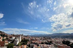 a view of a city under a cloudy sky at Casa Danna in Sucre