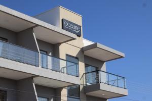 a building with a sign on the side of it at Oceane Norte Hotel in Parnaíba