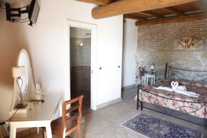 Postel nebo postele na pokoji v ubytování Il Borgo Ariccia Resort