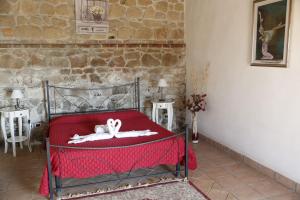 Postel nebo postele na pokoji v ubytování Il Borgo Ariccia Resort