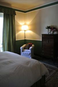 Postel nebo postele na pokoji v ubytování Palazzo Zecchino B&B