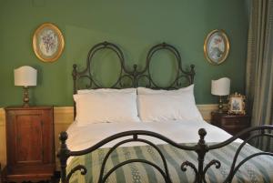 Postel nebo postele na pokoji v ubytování Palazzo Zecchino B&B