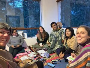 a group of people sitting in a room at Maska Mystic Tribe - Community Life in Pisac