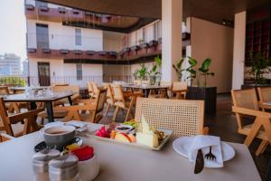 a tray of food on a table in a restaurant at 31 Park Hotel in Pokhara