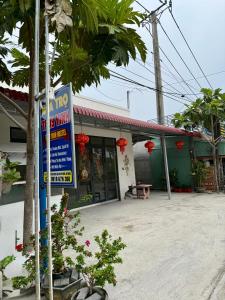 a no smoking sign in front of a building at Thùy Vinh Homestay in Phú Quốc