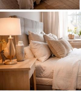 a bedroom with a bed and a table with a lamp at Amigos Land in Zeralda +2 photos