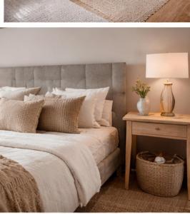 a bedroom with a bed and a table with a lamp at Amigos Land in Zeralda