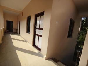 an empty hallway of a house with a window at Le DPS Viste in Rāyampālaiyam