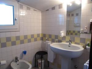 Kúpeľňa v ubytovaní Hotel Rizzi + 19 fotografií