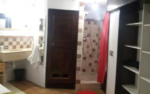 a bathroom with a shower and a toilet and a sink at The office 2020 in Tres Cantos +14 photos