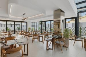 Un restaurant sau alt loc unde se poate mânca la Warner Boutique Hotel-Adults Only
