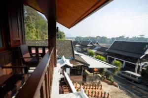 a view from the balcony of a building at Oudomsin Guesthouse in Luang Prabang