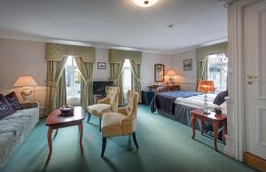 Posezení v ubytování Hotel Kong Carl - Unike Hoteller + 37 fotografií
