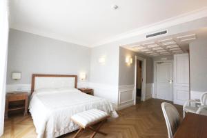 Letto o letti in una camera di Tesoretto Hotel