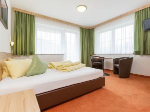 En eller flere senge i et værelse på Panoramablick Sölden