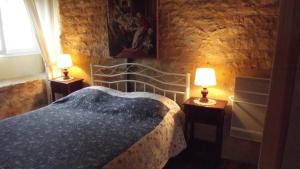 Katil atau katil-katil dalam bilik di Domaine des 3 vallee dordogne +44 gambar